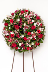 Funeral wreath isolated on a white background.