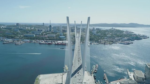 Aerial drone view of The Zolotoy Golden Bridge. Cable-stayed bridge across the Zolotoy Rog (Golden Horn) in Vladivostok, Russia