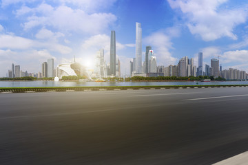 Obraz premium Road pavement and Guangzhou city buildings skyline