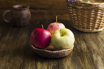 Apples on wooden table