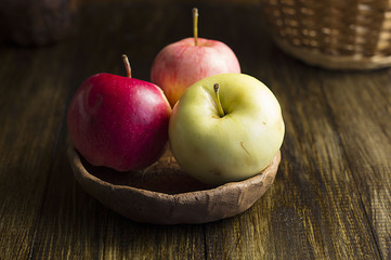 Apples on wooden table