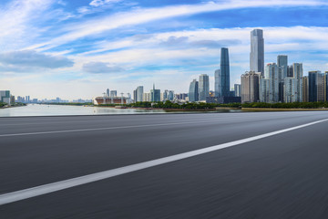 Road pavement and Guangzhou city buildings skyline