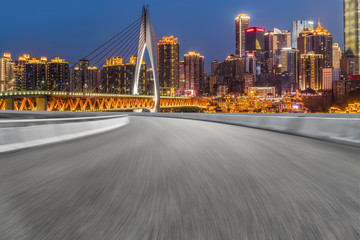 Obraz premium Road pavement and Chongqing urban architecture skyline