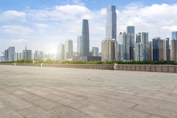 Urban skyscrapers with empty square floor tiles