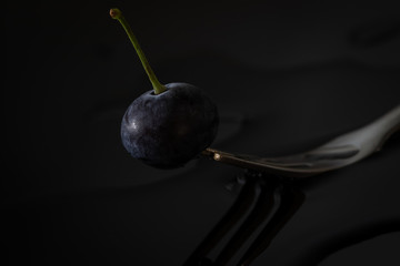 Soft fruit, blueberry isolated against a dark background