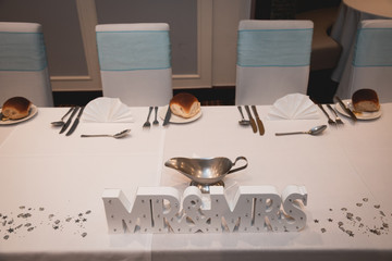 Mr & Mrs Letters on the top table in a weding reception