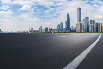 Road pavement and Guangzhou city buildings skyline