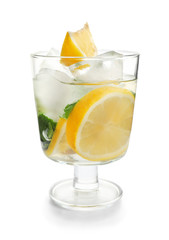 Glass of fresh lemonade on white background