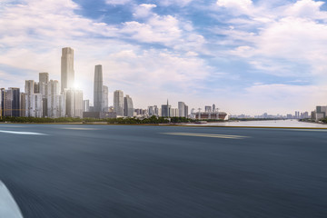 Fototapeta premium Road pavement and Guangzhou city buildings skyline
