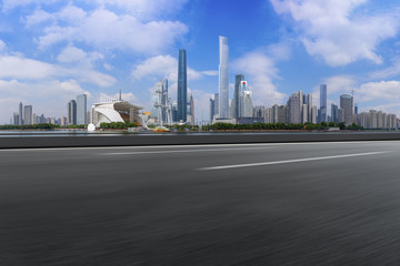 Fototapeta na wymiar Road pavement and Guangzhou city buildings skyline