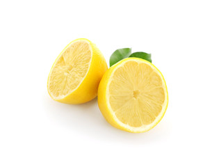 Halves of ripe lemon on white background