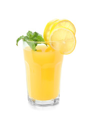 Glass of fresh lemon juice and mint on white background