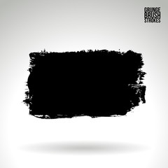 Black brush stroke and texture. Grunge vector abstract hand - painted element. Underline and border design.