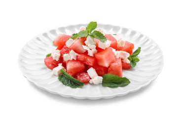 Plate with delicious watermelon salad on white background