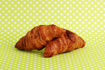 Two french croissants on the table