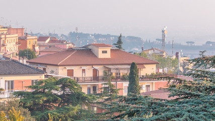 Old houses and trees during sunset in beautiful town of Albano Laziale timelapse, Italy