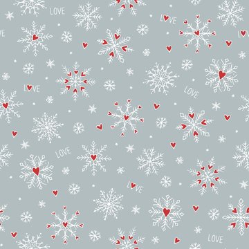 Seamless pattern with cute hand drawn snowflakes and little red hearts