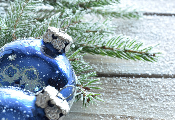 Christmas card with snow and decorative ball