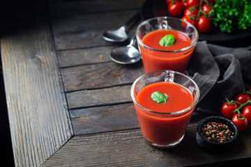 Tomato soup on wooden table