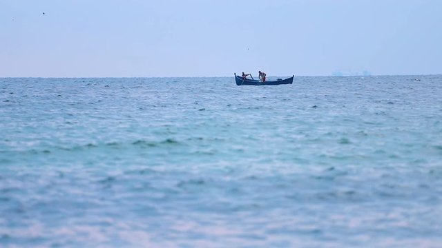 Two men fishing in a boat