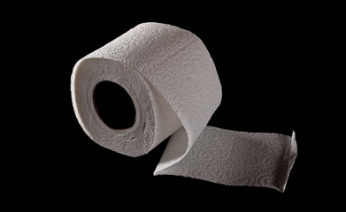 Toilet paper roll isolated on black background, clipping path
