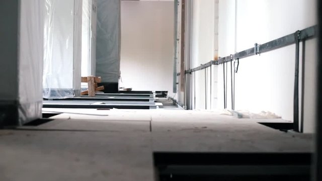 Raised floor. Production process close-up. Excursion. Industrial shooting.