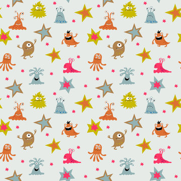 Seamless background with cheerful aliens on a light background