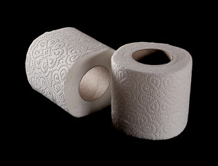 Toilet paper roll isolated on black background, clipping path