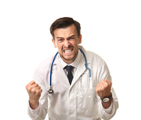 Handsome stressed doctor on white background