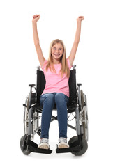 Happy teenage girl in wheelchair on white background