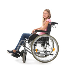 Obraz na płótnie Canvas Teenage girl in wheelchair on white background