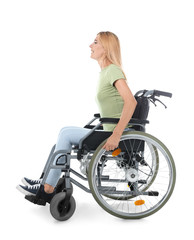 Naklejka na ściany i meble Beautiful woman in wheelchair on white background
