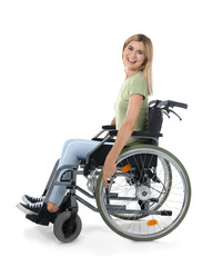 Plakat Beautiful woman in wheelchair on white background