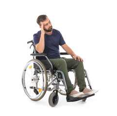 Obraz premium Sad man in wheelchair on white background