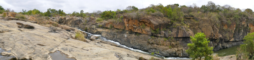 Fototapeta na wymiar Rock Formations and Waterfall at Lowveld National Botanical Garden, Nelspruit, Mpumalanga, South Africa