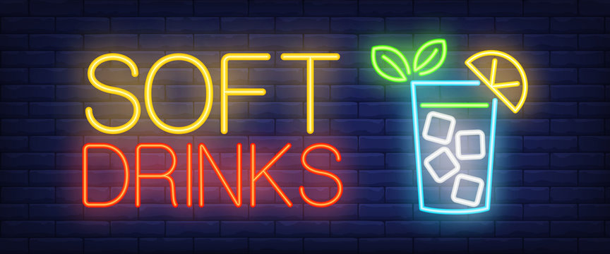 Soft drinks neon sign. Glass of lemonade with ice cube on brick wall background. Vector illustration in neon style for family cafe and restaurant