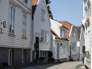 Street with white wooden houses in old centre of Stavanger - Norway - architecture background