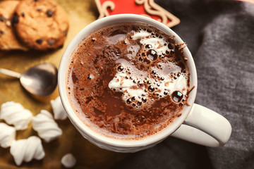 Cup of hot chocolate with marshmallows on tray