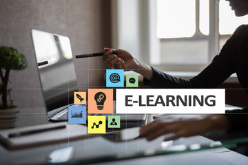E-Learning on the virtual screen. Internet education concept.