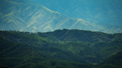 Mountain peak range landscape. Green mountain range view. Mountain peak blue sky white clouds panorama
