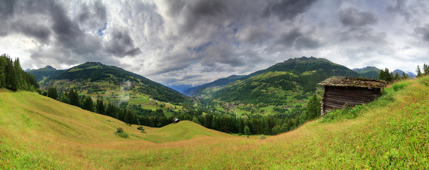 Beautiful panoramic view of the Val d’Anniviers valley in Switzerland with the villages...