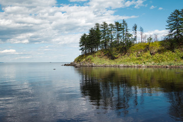 A wonderful landscape on the shore of the Japanese Sea with rocks near the Soviet harbor