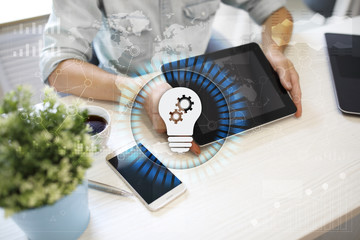Fototapeta na wymiar Lamp icon on virtual screen. Business solution. Innovation concept.