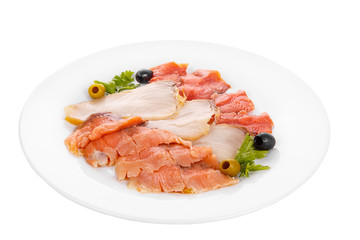 Cold appetizer before alcohol, assorted fish, salmon fillet, lightly salted, chum, smoked with wasabi sauce, mayonnaise, sour cream, olives, parsley on plate, white isolated background Side view