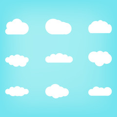 Set of white clouds on a blue background. Flat style