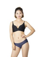 Obraz premium Chinese woman posing in panties and bra on white background