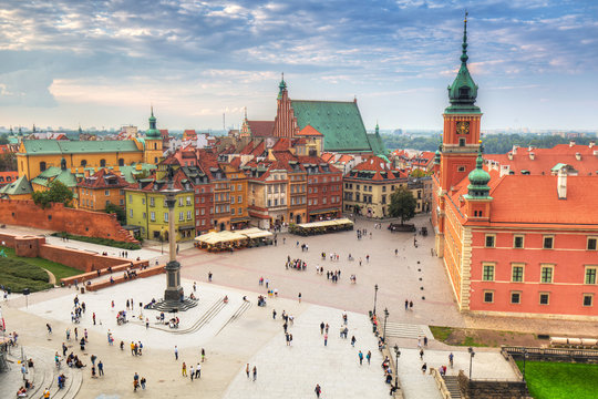 The Royal Castle square in Warsaw city at sunset, Poland.