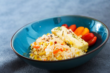 Baked salmon, vegetables and sorrel sauce accompanied oatmeal, lentil and cooked rice