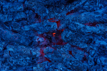 Bonfire campfire charcoal close up in evening