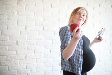 Pregnant young beautiful girl on the ninth month 